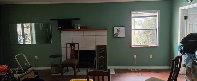 living area with hardwood / wood-style floors