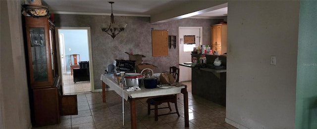 tiled dining space featuring a notable chandelier, ornamental molding, and beam ceiling