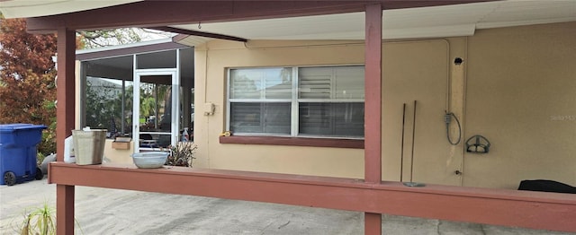 exterior space with a sunroom