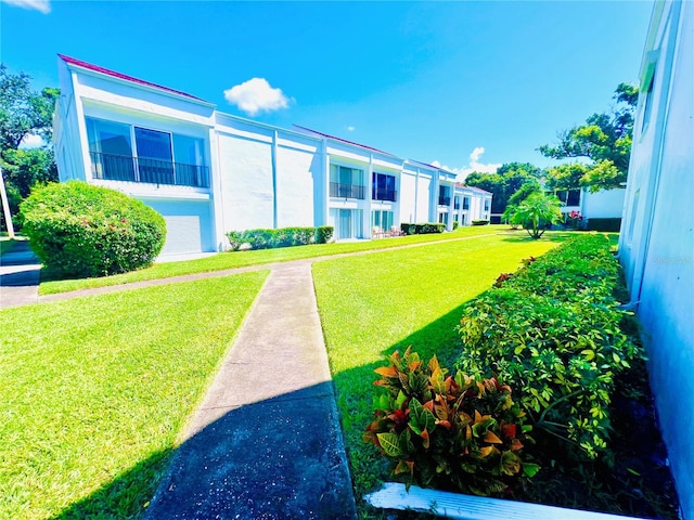 exterior space featuring a lawn