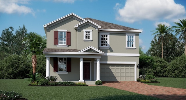 view of front of house featuring a garage and a front yard