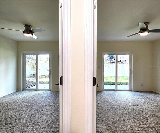 carpeted spare room with ceiling fan