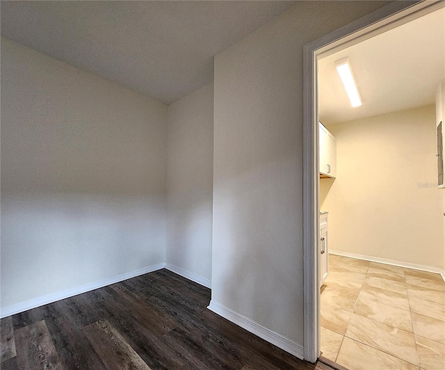 unfurnished room featuring light wood-type flooring