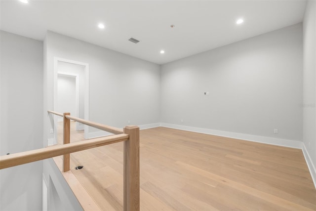 unfurnished room featuring light wood-type flooring