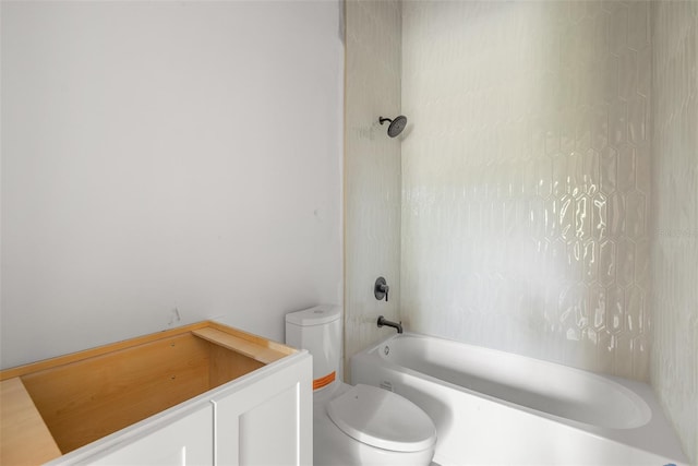 bathroom with toilet and shower / bathing tub combination