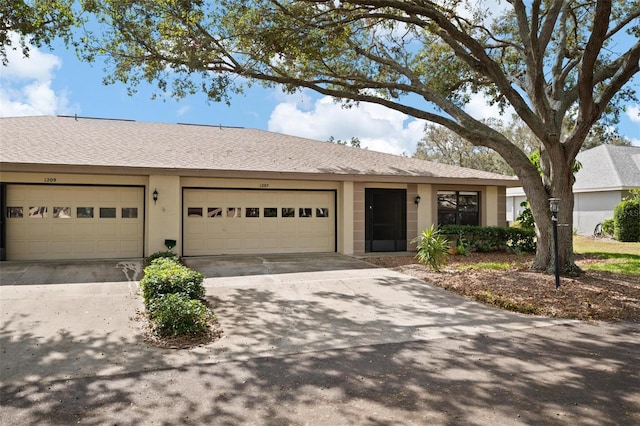 single story home with a garage