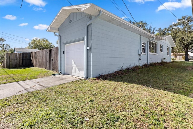 garage with a lawn