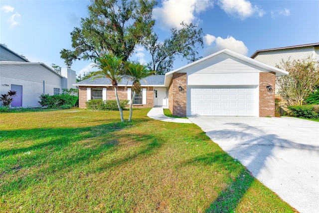 ranch-style home featuring a front yard and a garage