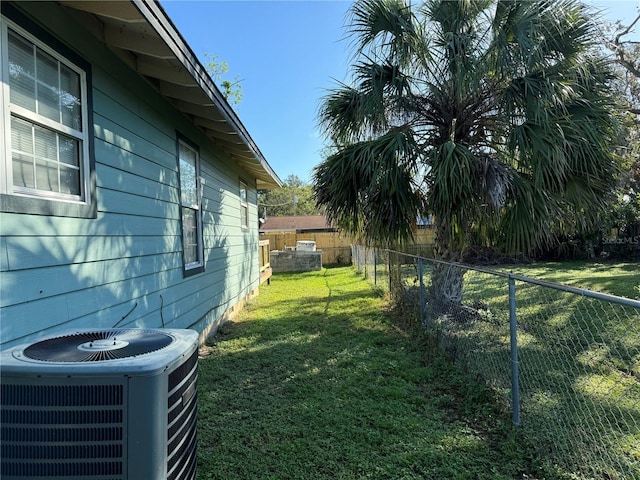 view of yard featuring central AC unit