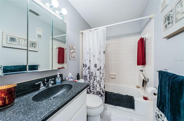 full bathroom with tile patterned floors, shower / bath combination with curtain, a textured ceiling, toilet, and vanity