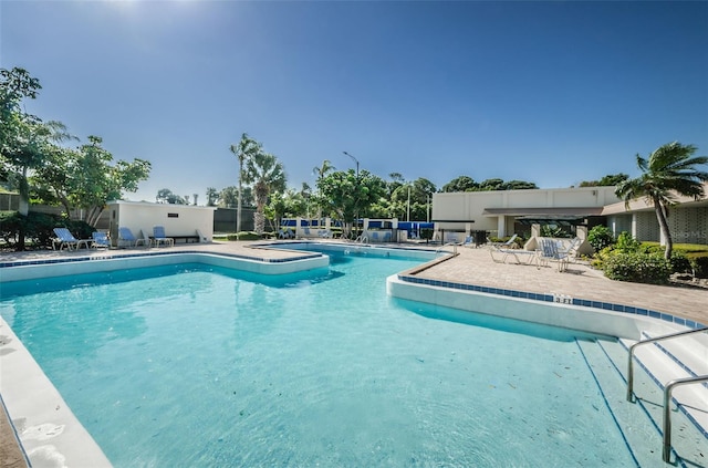 view of pool featuring a patio area