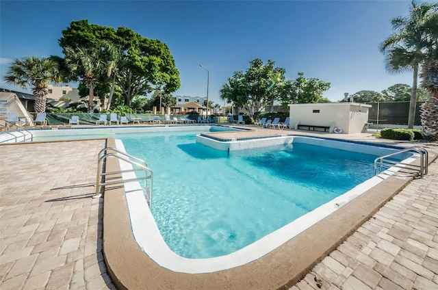 view of pool featuring a patio