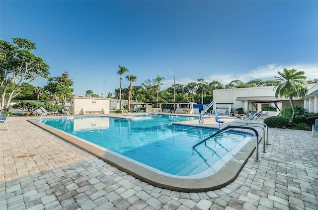 view of pool featuring a patio