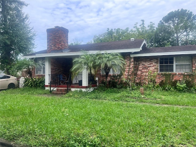 exterior space with a yard