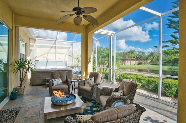 sunroom / solarium with ceiling fan