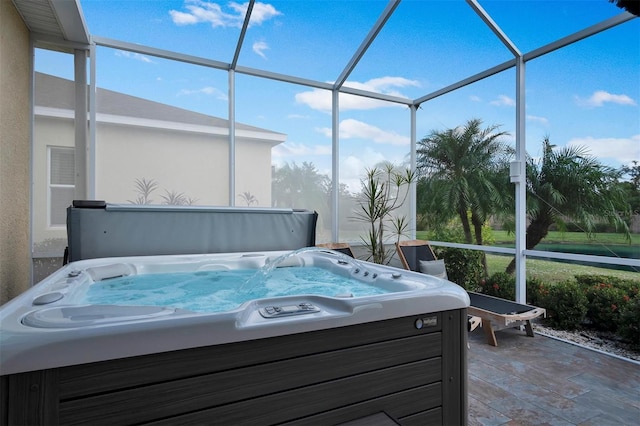 sunroom featuring a hot tub