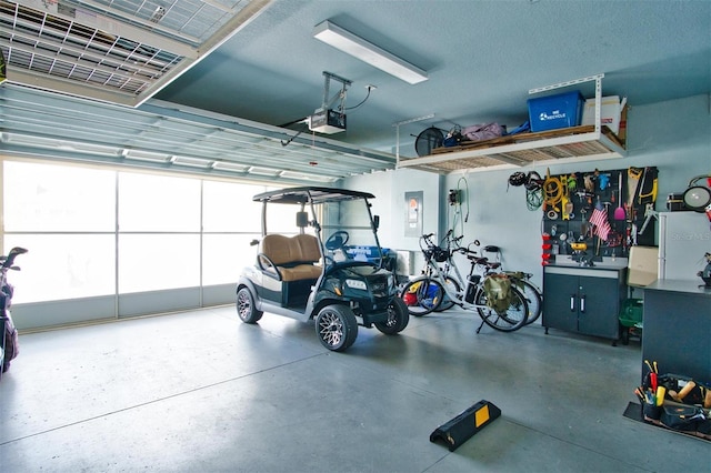 garage featuring a garage door opener