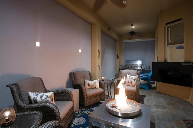 living room featuring ceiling fan