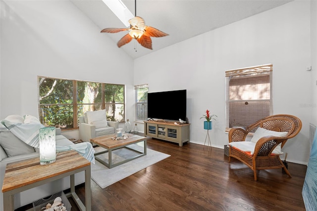 living room with high vaulted ceiling, plenty of natural light, dark wood-type flooring, and ceiling fan