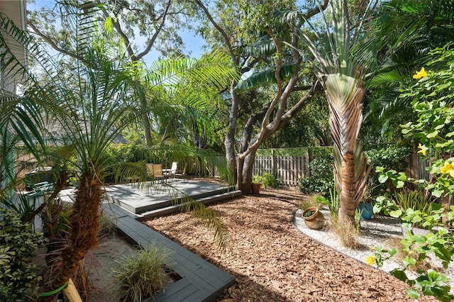 view of yard featuring a wooden deck