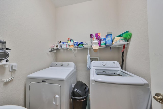 laundry room featuring washing machine and dryer