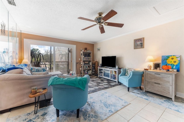 tiled living room with ornamental molding, a textured ceiling, and ceiling fan