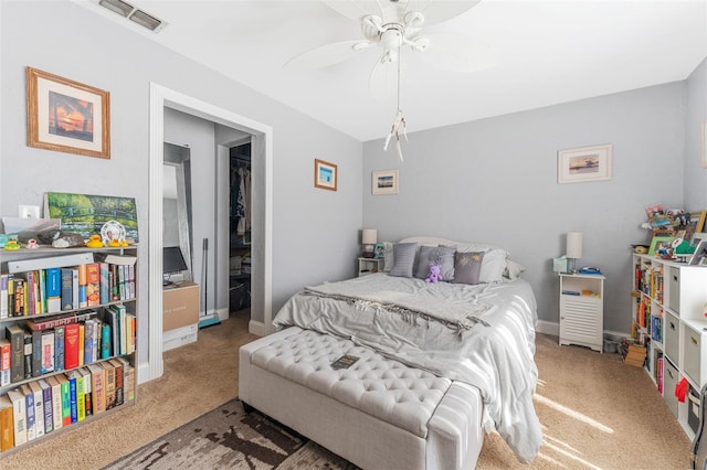 bedroom with ceiling fan and carpet floors