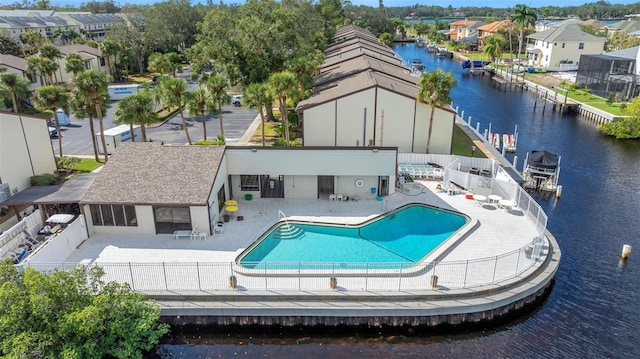 exterior space featuring a patio area and a water view