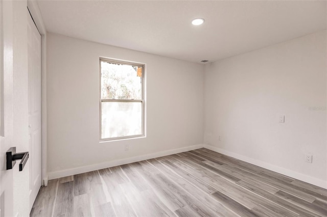 empty room featuring light hardwood / wood-style floors