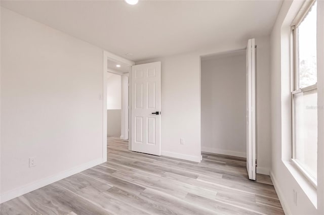 unfurnished bedroom featuring light hardwood / wood-style flooring