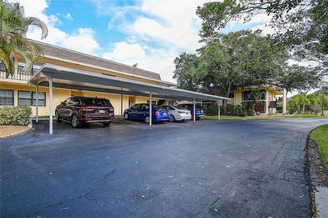 view of parking featuring a carport