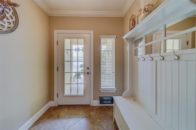 mudroom featuring ornamental molding and light tile patterned floors