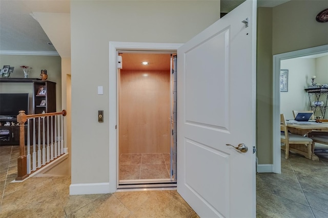 94 The Cove Way, Indian Rocks Beach, FL 33785 - hallway featuring an office area, crown molding, baseboards, elevator, and tile patterned floors