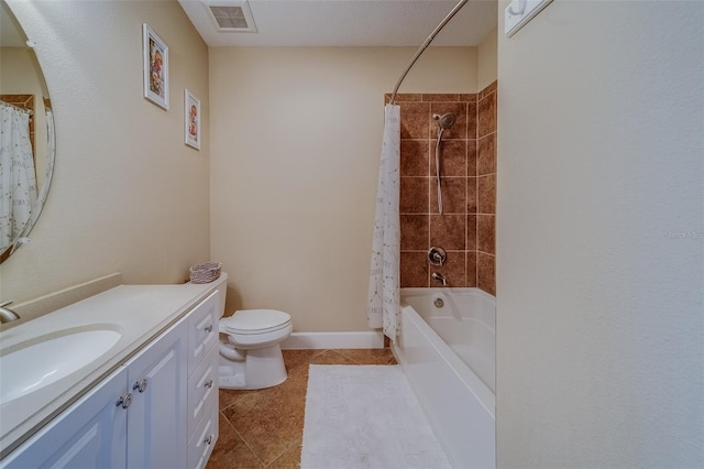 full bathroom with tile patterned floors, vanity, toilet, and shower / tub combo