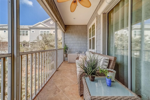 balcony featuring ceiling fan