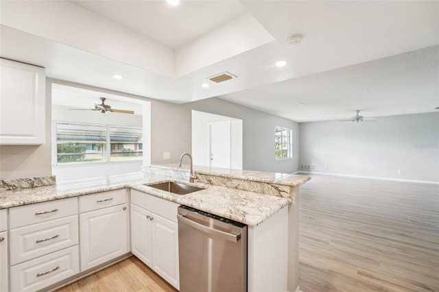 kitchen with white cabinetry, dishwasher, sink, light stone counters, and light wood-type flooring