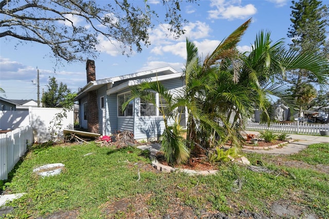 exterior space with a front yard