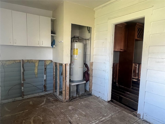 utility room featuring electric water heater