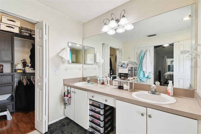 bathroom featuring vanity and hardwood / wood-style flooring