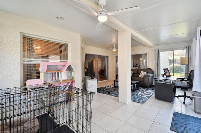 interior space featuring ceiling fan