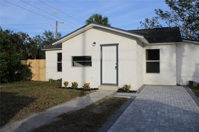 view of outbuilding featuring a yard