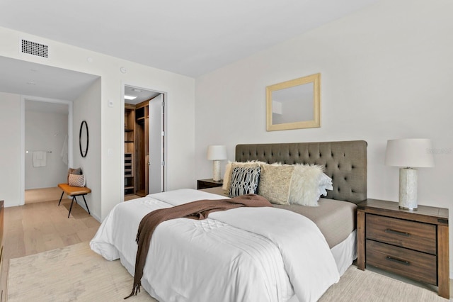 bedroom with light hardwood / wood-style flooring