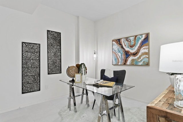 dining area featuring light tile patterned floors