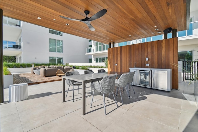 view of patio / terrace featuring an outdoor living space and ceiling fan