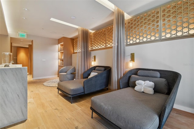 living area with wood-type flooring