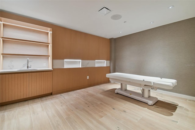 interior space featuring light hardwood / wood-style floors and sink