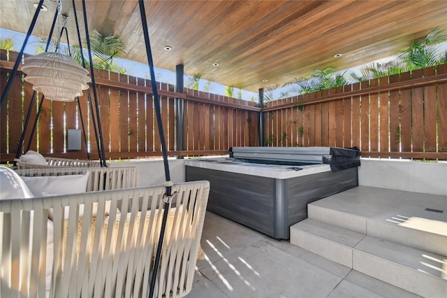 view of patio with a hot tub