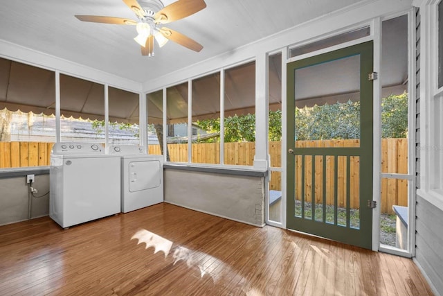 interior space with ceiling fan and independent washer and dryer