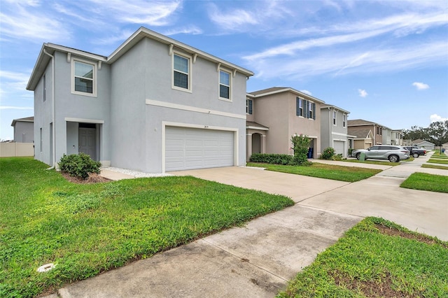 view of front facade with a front yard and a garage