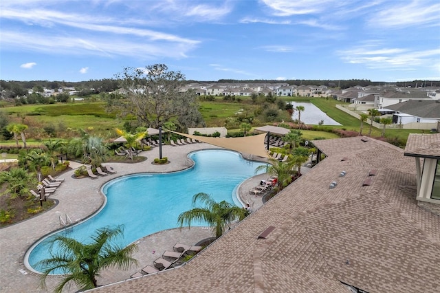 view of swimming pool with a patio area